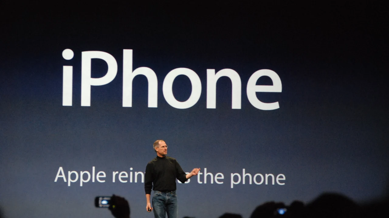 Close-up of a premium smartphone device on a desk representing current Apple hardware.